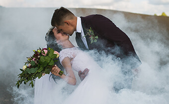 married couple kissing